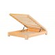 A special designed double bed made of pine wood filled with a delivery mat and a gift assembly