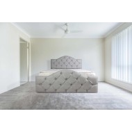 מיטה מעץ מלא מרופדת בדמוי עור , בתוספת קפיטונ'ג - דגם 6005