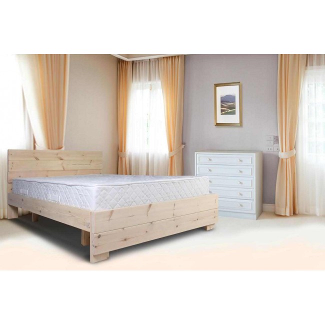 A full-wood pine bed