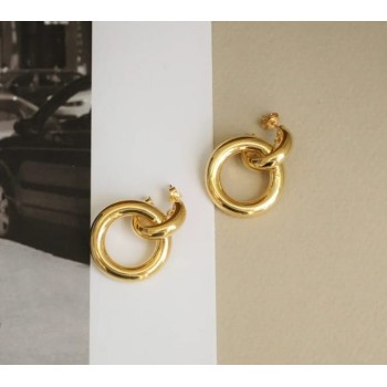 14K gold earrings threaded into each other 14K gold earrings threaded into each other